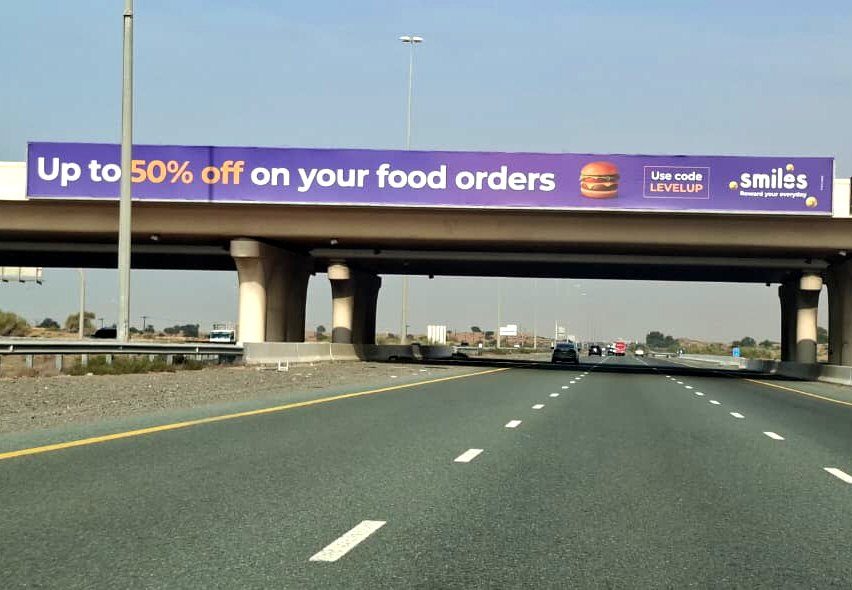 UAQ Entrance Area — Back-Lit Bridge Banner, Ajman