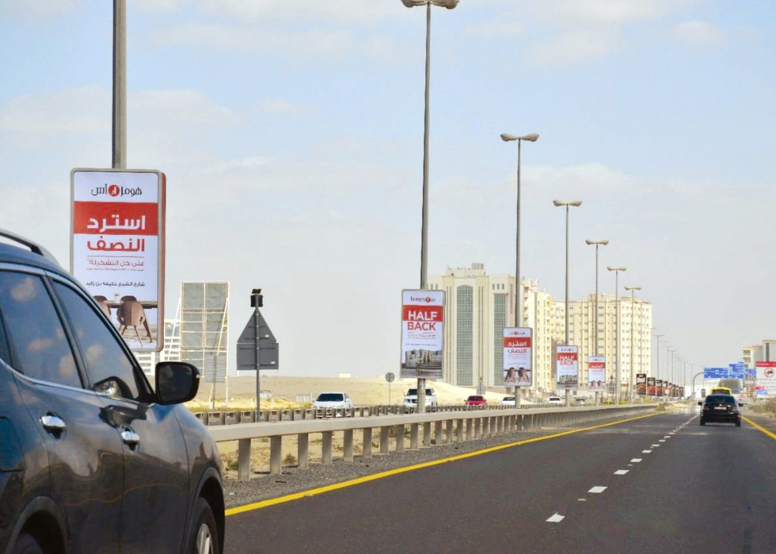 Al Ittihad Rd After Ajmal Makkan R/A Area — Back-Lit Lamppost, Ajman