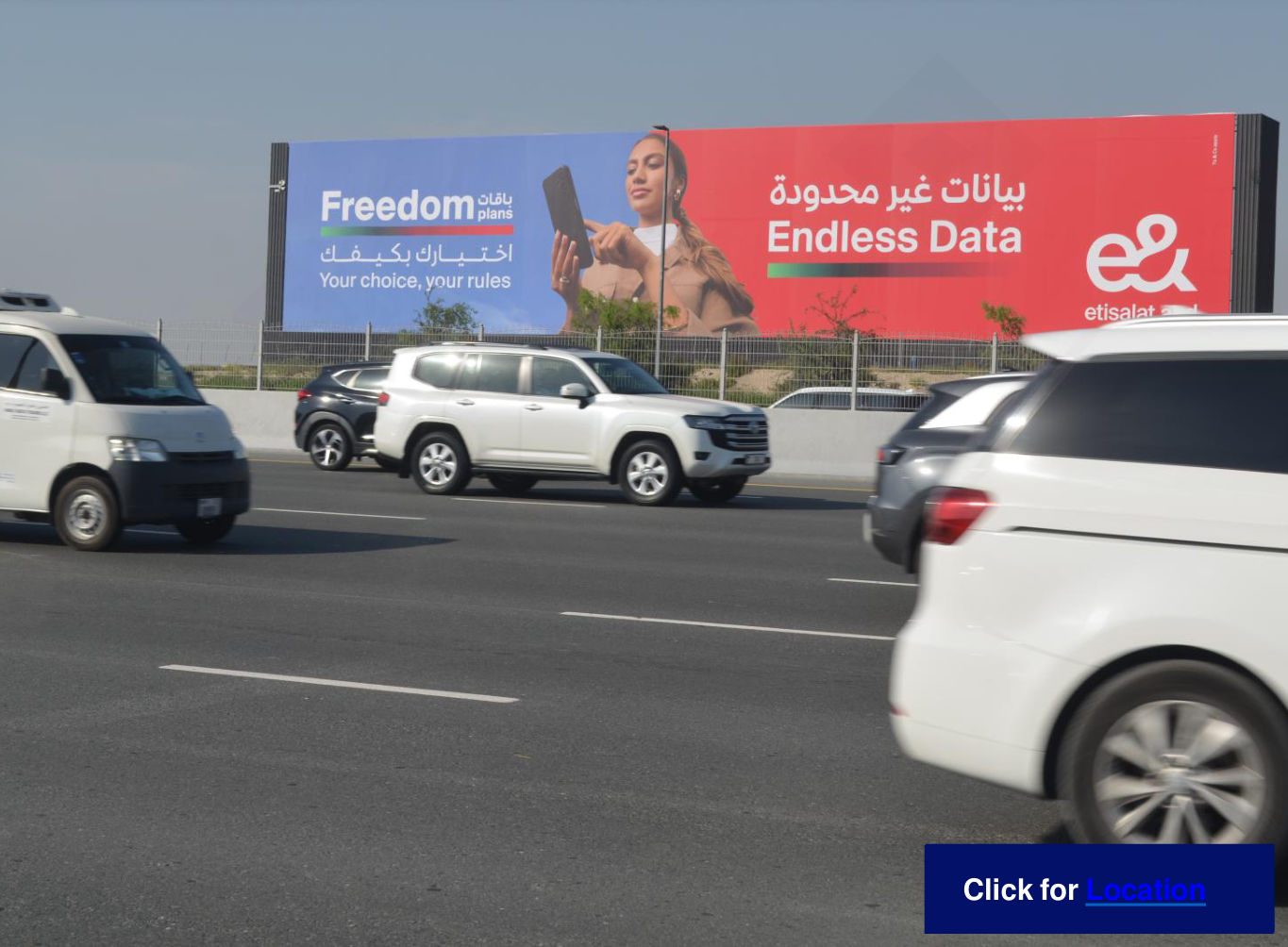 DXB–Al Ain Rd — Nad Al Sheba, Opp. Avenue Mall — Front-Lit Hoarding, Dubai