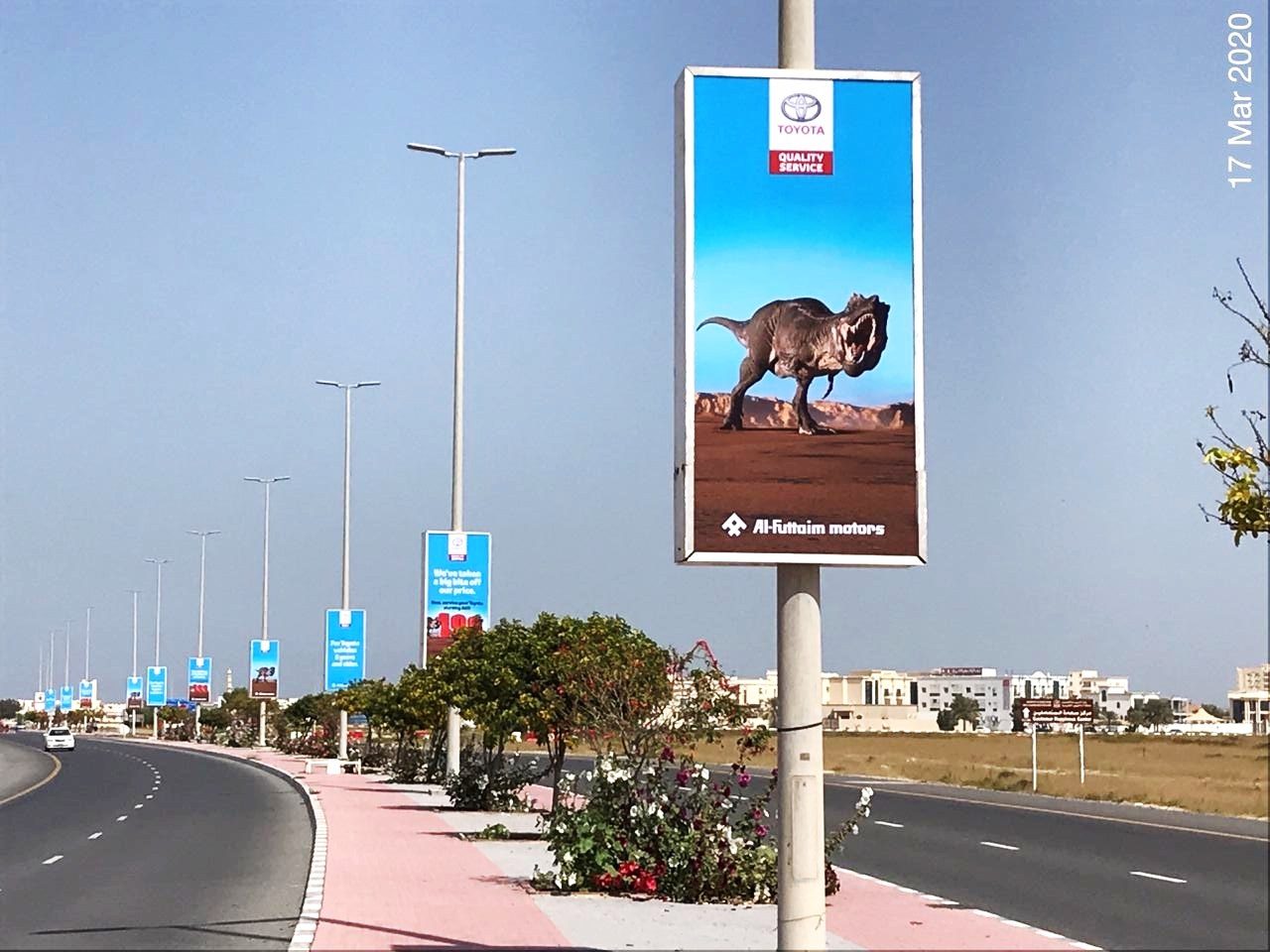 King Faisal Rd — Clock R/A Area — Back-Lit Lamppost, Umm Al Quwain